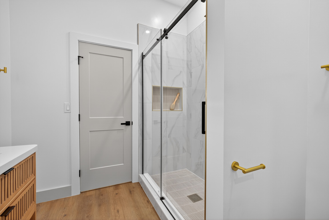 Bathroom shower remodel in Lawrenceville GA — walk-in shower with tile by One For All Services